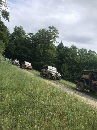 Jeeps traveling on a trail at Kissing Bridge